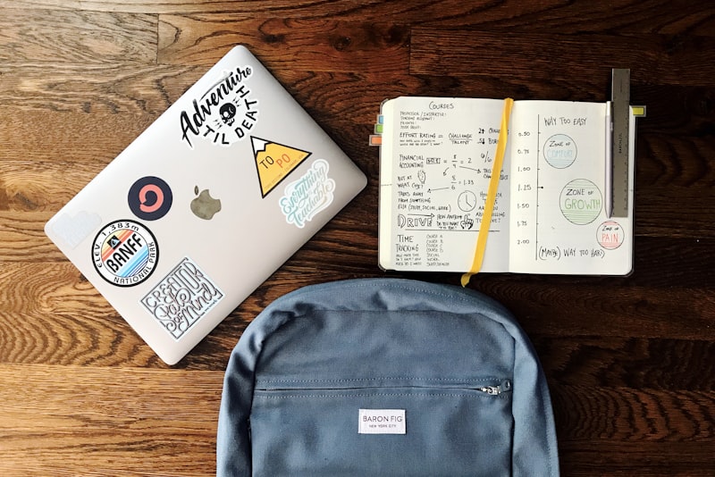 An open notebook with handwritten foreign vocabulary beside a cup of coffee